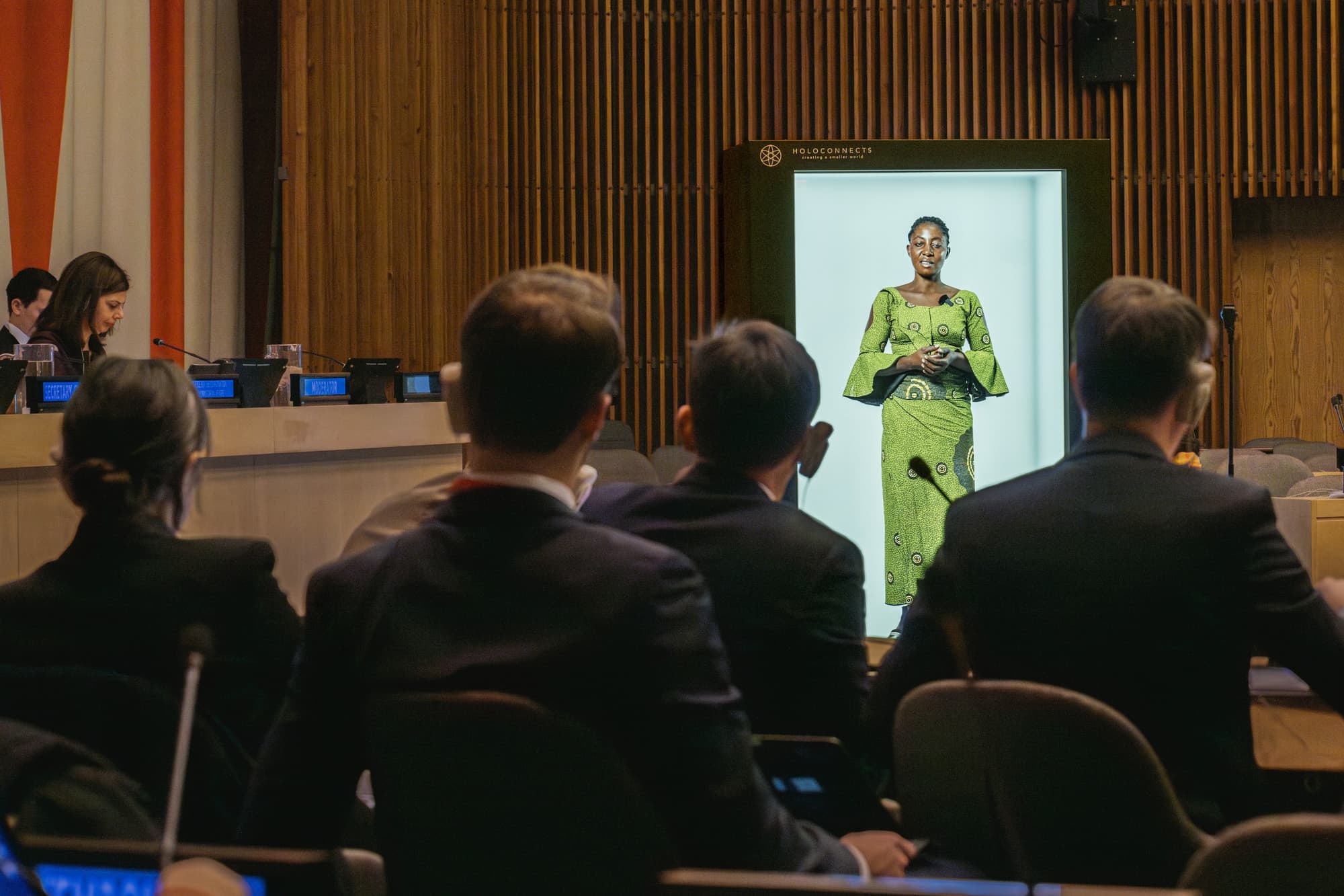 An educator presented as a hologram to a classroom.