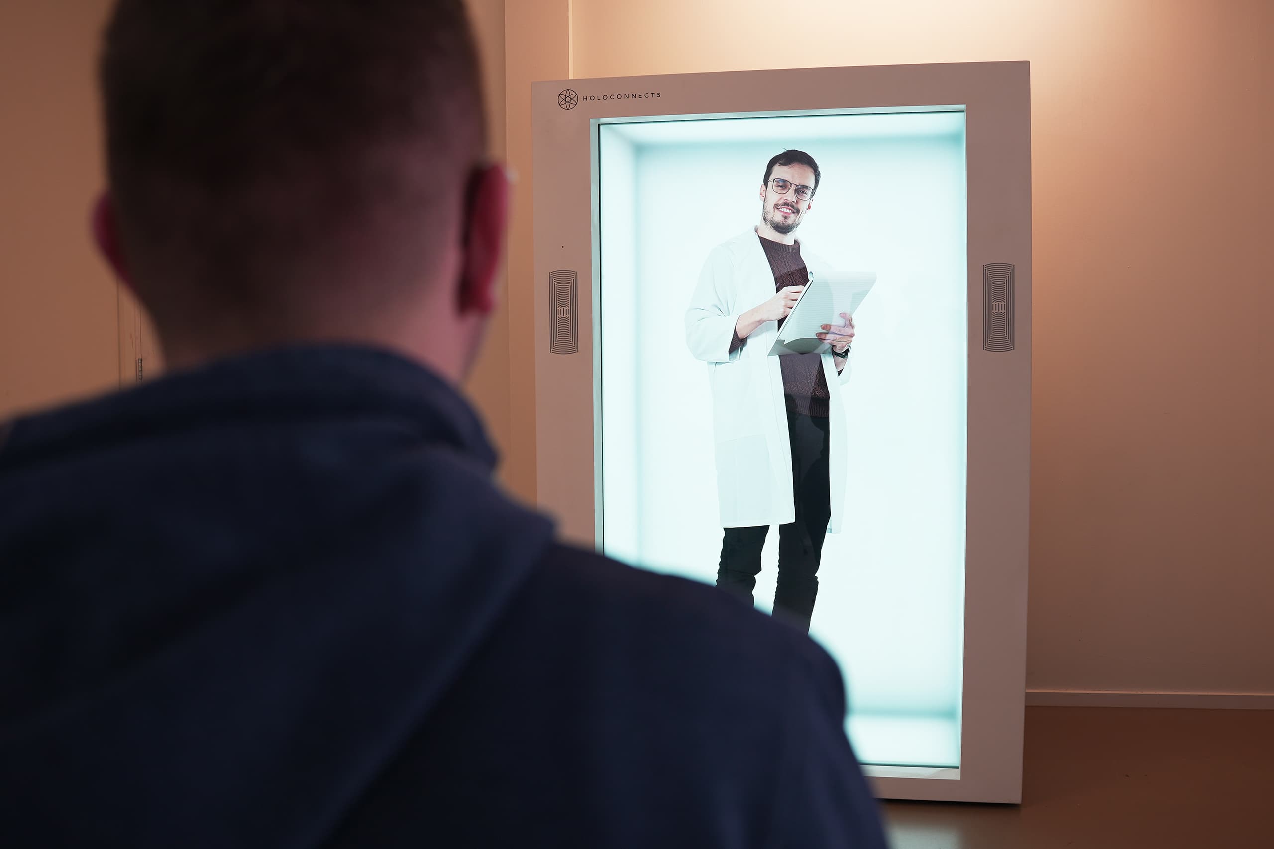 A doctor delivered as a life size hologram for remote telehealth.